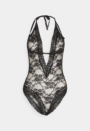 Black lace bodysuit with a plunging neckline, floral pattern, adjustable straps, and a central embellishment. Semi-sheer material.