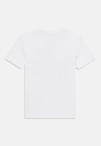 T-shirt blanc avec un col rond et des manches courtes. Fabriqué en tissu coton lisse, il présente un dos uni sans graphiques ni embellissements.