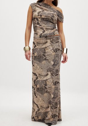 Maxi dress in a beige and black animal print with an asymmetric neckline, fitted bodice, and flowing skirt. Smooth fabric and textured accents.