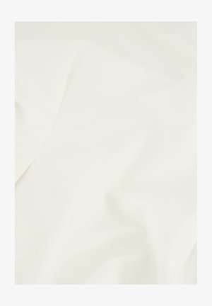 Smooth off-white fabric with gentle folds and soft texture, creating a subtle shadow pattern.