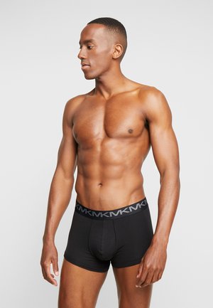 Sorte boxer briefs med en struktureret sort elastik med et gentaget logo. Stoffet ser strækbart og blødt ud.