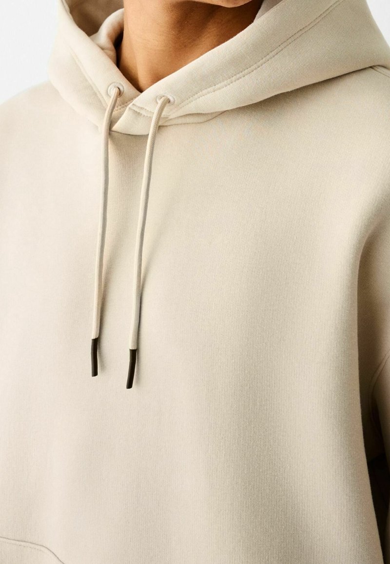 Bershka Sweat à capuche beige (Seconde main) ZALANDO