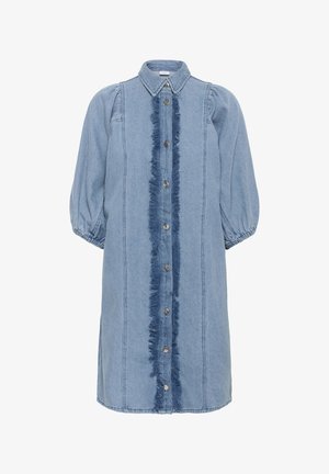 Denimkleit kraeega, puhvade varrukatega ja keskse fransside detailiga. Omab nööbikinnitust ja kontrastset tikkimist helesinisel kangal.