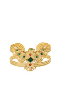 Goldfarbener Armreif mit einem Vogeldesign, verziert mit grünen und orangefarbenen Edelsteinen. Das Band hat eine strukturierte Oberfläche und mehrere schlanke Kurven.