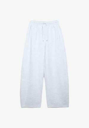 Hellgraue, weite Sweatpants aus weicher Baumwollmischung. Verfügt über einen elastischen Bund mit Kordelzug und Seitentaschen.