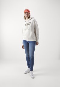 Levi's® GRAPHIC STANDARD - Felpa - cloud dancer