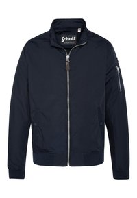 Corta-vento azul-marinho com fecho éclair na frente, gola alta, bolsos laterais e um bolso com fecho éclair na manga. Feito em tecido suave com punhos canelados.