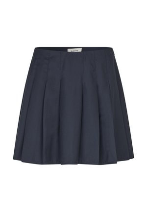 Jupe plissée bleu marine foncé avec une texture lisse, de longueur moyenne jusqu'à la cuisse, et une fermeture éclair latérale dissimulée ; étiquette visible à la taille.