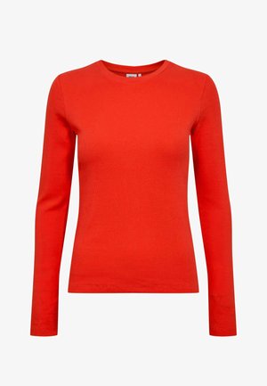 Röd långärmad topp i ribbad tyg. Har en rund halsringning och figursydd silhuett. Enkelt design utan synliga mönster eller dekorationer.