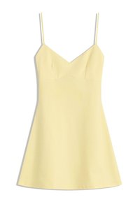 Yellow spaghetti strap dress with a V-neckline, fitted bodice, and flared skirt. Smooth texture, minimalistic design, no visible patterns.