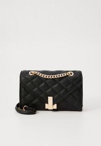 Black quilted handbag with gold chain strap, rectangular shape, smooth texture, and a geometric clasp detail on the front.