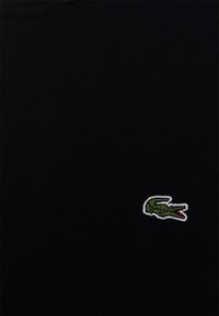 Lacoste Stickad tröja - black