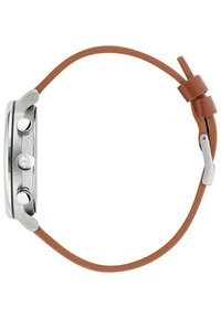 Hõbedane roostevabast terasest kell rohelise äärisega, pruuni nahkrihmaga ja kolme hõbedase nupuga. Omab sileda tekstuuri ja minimalistlikku disaini.