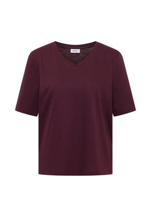 Bordowa koszulka z krótkim rękawem i dekoltem w serek, z prostym dołem i miękką fakturą materiału, z metką "CECIL" wewnątrz kołnierza.