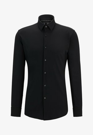 Black long-sleeve shirt crafted from smooth fabric, featuring a button-up front, collar, and tailored fit with subtle stitching detail.