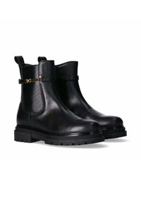 Schwarze Leder-Ankle-Boots mit glatter Oberfläche, elastischen seitlichen Einsätzen und goldfarbenen Hardware-Akzenten. Dicke, robuste Gummisohlen sorgen für Stabilität.