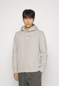 Calvin Klein Jeans MONOLOGO - Jersey con capucha - porpoise