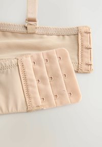 Beige beha-band met verstelbare haakjes, een gladde textuur en elastisch materiaal met een subtiele glans. Ontworpen voor een veilige pasvorm en comfort.