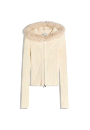 Giacca zip-up a coste crema con cappuccio foderato in pelliccia sintetica, maniche lunghe e silhouette aderente con chiusura a zip liscia.