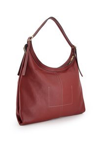 Red leather shoulder bag with a soft texture, curved shape, gold hardware, and white stitching accents. Features a zippered top closure.