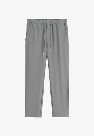 Pantalons gris à taille élastique avec cordon de serrage et poches latérales, coupe droite, style décontracté.