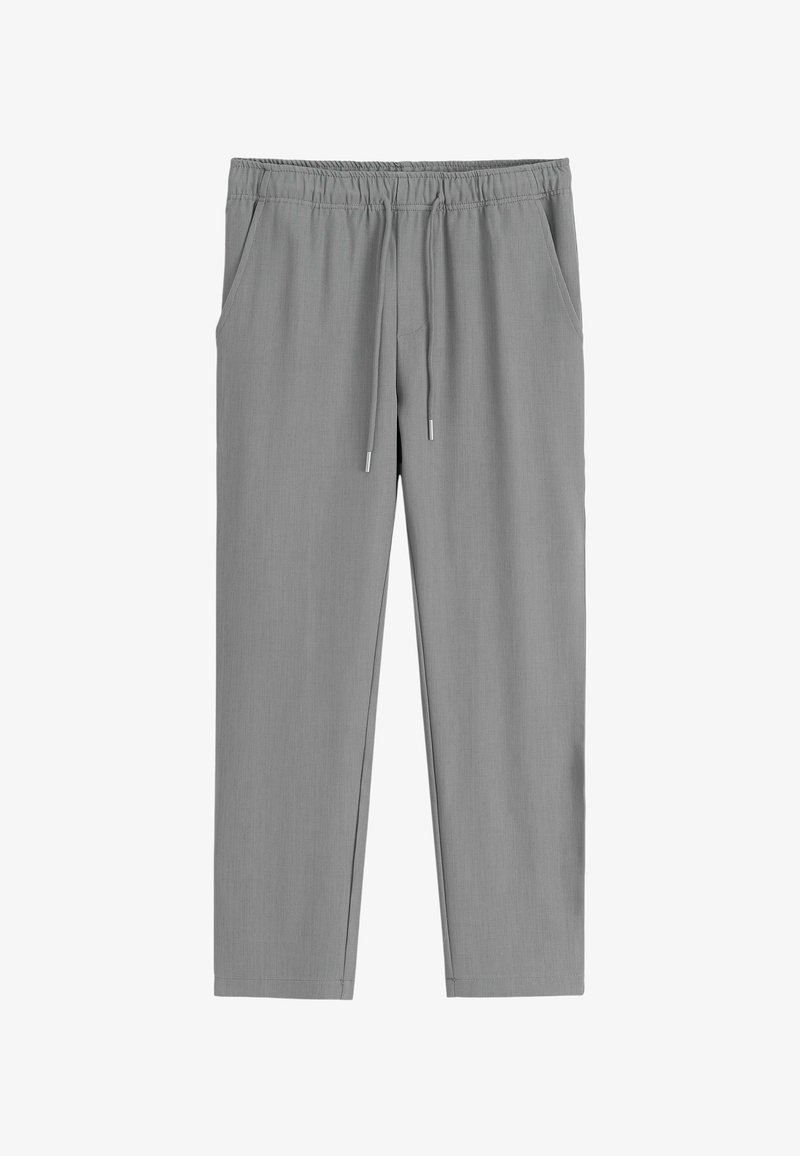 Pantalons gris à taille élastique avec cordon de serrage et poches latérales, coupe droite, style décontracté.