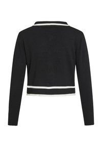 Svart kortärmad cardigan med långa ärmar, har en vit randig remsa nertill och en kontrasterande vit krage. Mjuk stickad textur.