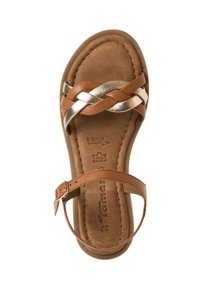 Sandalo in pelle sintetica marrone con cinture intrecciate, accent metallici, cinturino alla caviglia regolabile e suola marrone texturizzata. Taglia 37.
