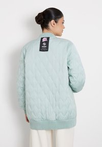 Guess Giacca da mezza stagione - himmelblau