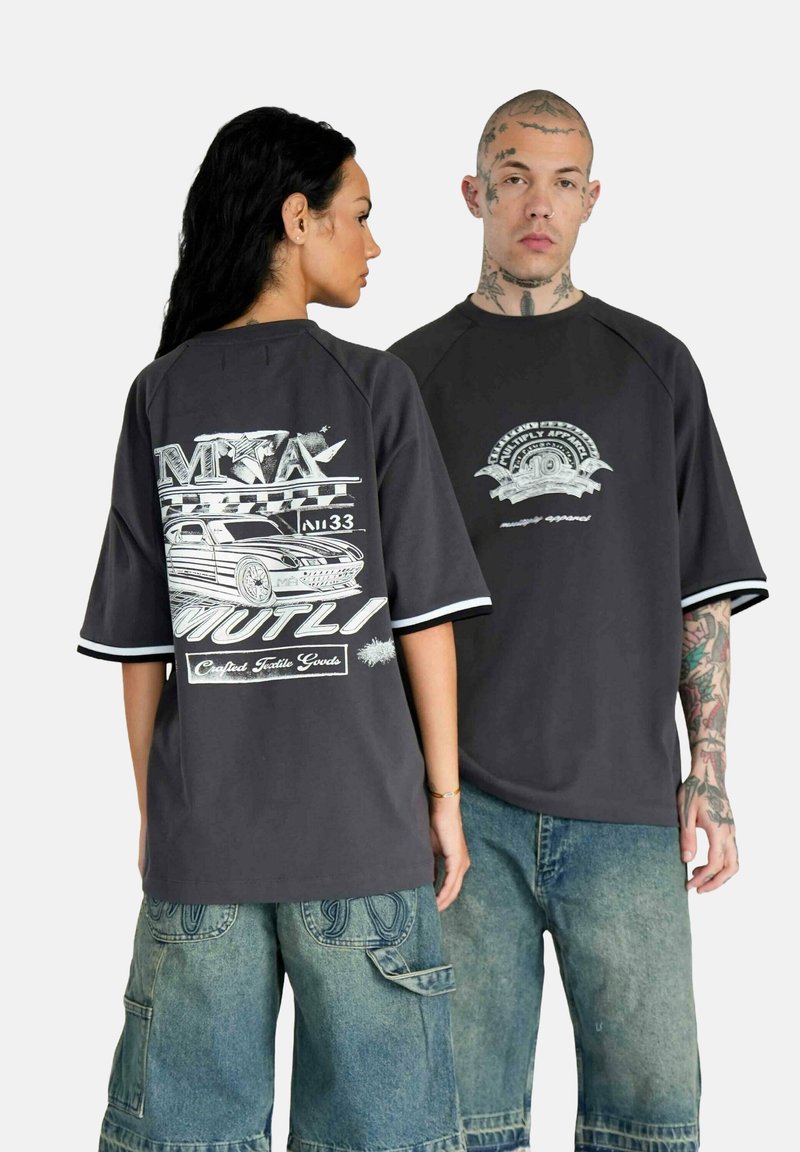 Dark gray oversized T-shirt with short sleeves and contrasting white trim. Graphic designs on front and back feature automotive motifs.