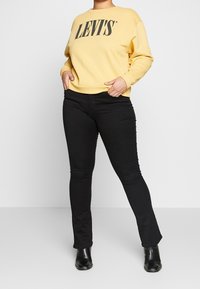 ONLY Carmakoma Vaqueros bootcut - black denim