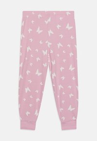Vaaleanpunaiset ribbileggingsit, joissa on valkoinen perhoskuvio. Muotoiltu malli, jossa on joustavat nilkkasaumat. Sileä pinta, kevyt materiaali.
