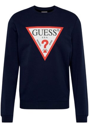 Marinblå crewneck sweatshirt med en triangel i röd och vit grafik med "GUESS U.S.A." och en frågetecken-logotyp i mitten.
