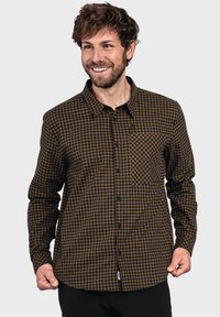 Braun und schwarz karierter Hemd mit Knöpfen und einer Brusttasche, aus weichem Material und mit langen Ärmeln. Geeignet für legere Anlässe.