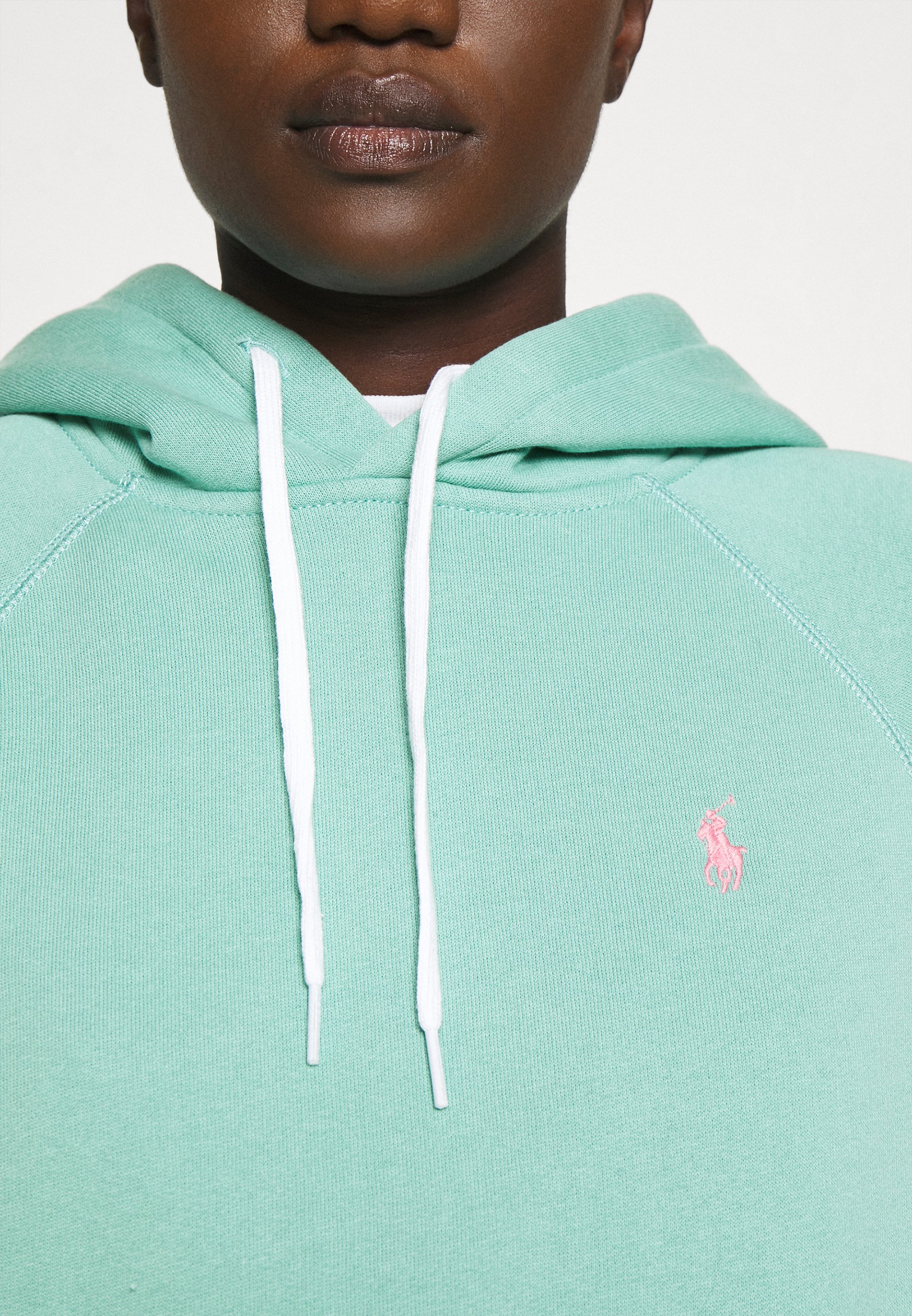 green polo pullover