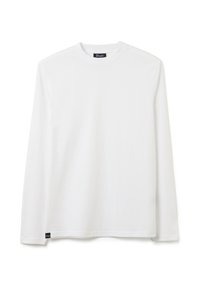 Weißes Langarm-T-Shirt mit Rundhalsausschnitt, aus Baumwolle. Hat einen geraden Schnitt, eine weiche Textur und ein kleines schwarzes Etikett am Saum.