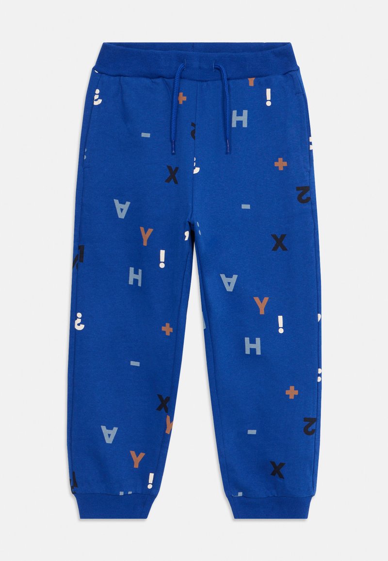 Blaue Jogginghose aus Baumwolle, mit einem gemischten Muster aus Buchstaben und Symbolen in Grau, Schwarz und Braun. Elastischer Bund mit Kordelzug.