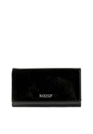 Black patent leather wallet with a sleek rectangular shape. Features a silver logo, glossy surface, and minimalist design.