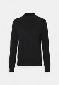 Svart tröja med hög muddkrage, långa raglanärmar och ribbade manschetter och nederkant. Tyget verkar slätt och lätt.