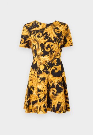 Short-sleeve black dress with ornate yellow-gold baroque swirl and floral patterns, fitted waist, and flared skirt.