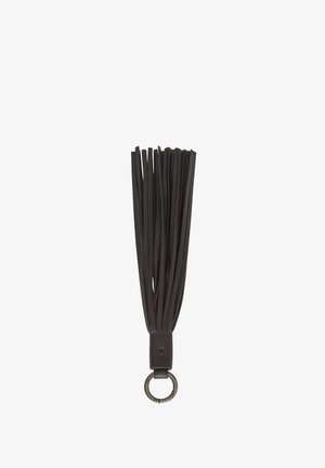 Portachiavi con nappine in pelle nera con più strisce sottili appese a un piccolo anello a forma di loop.