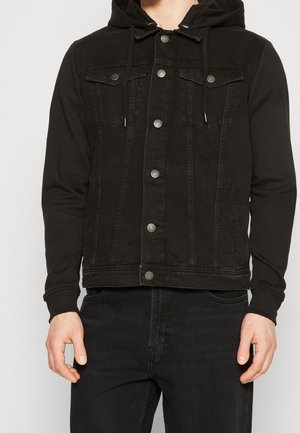 Black denim jacket with a hood, featuring button closures, chest pockets, and a contrasting fabric texture from the sleeves.