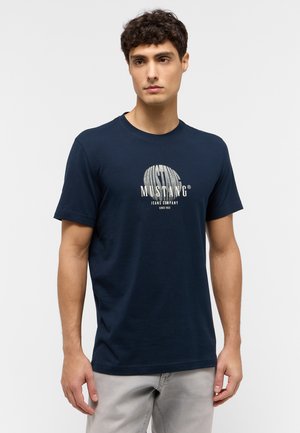 Navy blue cotton t-shirt with round neck, featuring a light gray text graphic "MUSTANG Jeans Company" centered on the front.