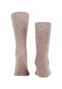 Gestrickte Socken in Hellrosa mit roten und grauen Sprenkeln, mit einem gerippten Bündchen und einem taillierten Design. Weiche Textur im gesamten Socken.