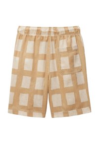 Shorts en lin beige avec un motif à carreaux crème. Dotés d'une taille élastique et d'une poche arrière unique. Tissu texturé et léger.