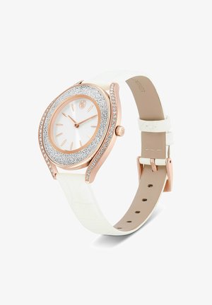 Elegante Armbanduhr in Roségold mit weißem Lederarmband, weißem Zifferblatt und funkelnden Kristallakzenten auf Lünette und Bandanstößen.