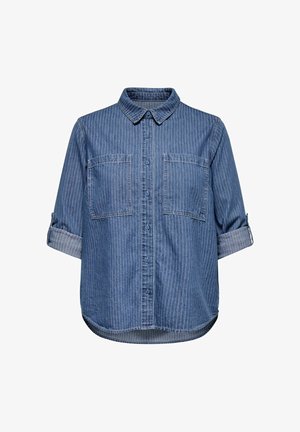 Sinine teksasärk valgete vertikaalsetega triipudega, kahe rinnatasku ja ülespööratud varrukatega.