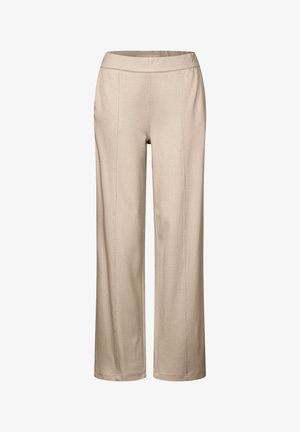 Vaahtokarkki, leveät housut, joissa on joustava vyötärönauha, sileällä pinnalla ja hienovaraisilla pystysaumoilla lisäyksinä.