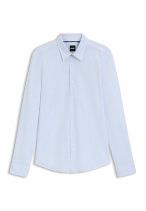 Vaaleansininen napapaitapaita, jossa on hienovarainen teksturoitu kuvio, pitkät hihat, terävä kaulus ja pyöristetty helma. Edessä on kuusi nappia.