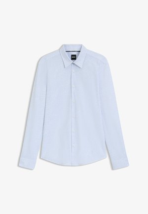 Camicia button-up azzurro chiaro con un sottile motivo testurizzato, maniche lunghe, colletto a punta e orlo arrotondato. Presenta sei bottoni sulla parte anteriore.